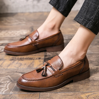 Mocasines de piel con borlas