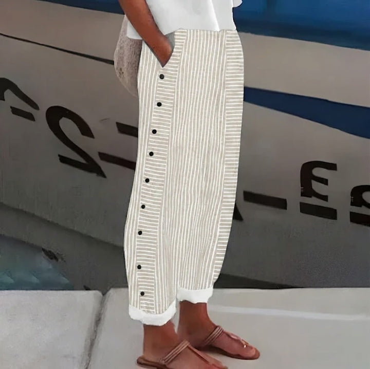 Salma - Pantalón recto de rayas con botones laterales