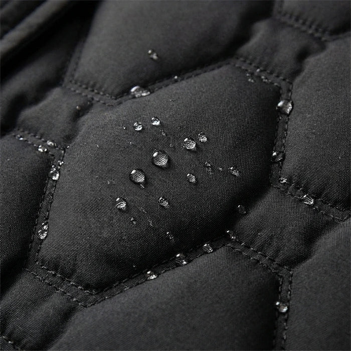 Lumira - Abrigo largo acolchado con capucha