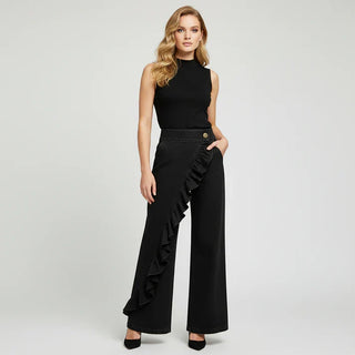 Violeta - Pantalones vaqueros asimétricos con volante y pierna ancha