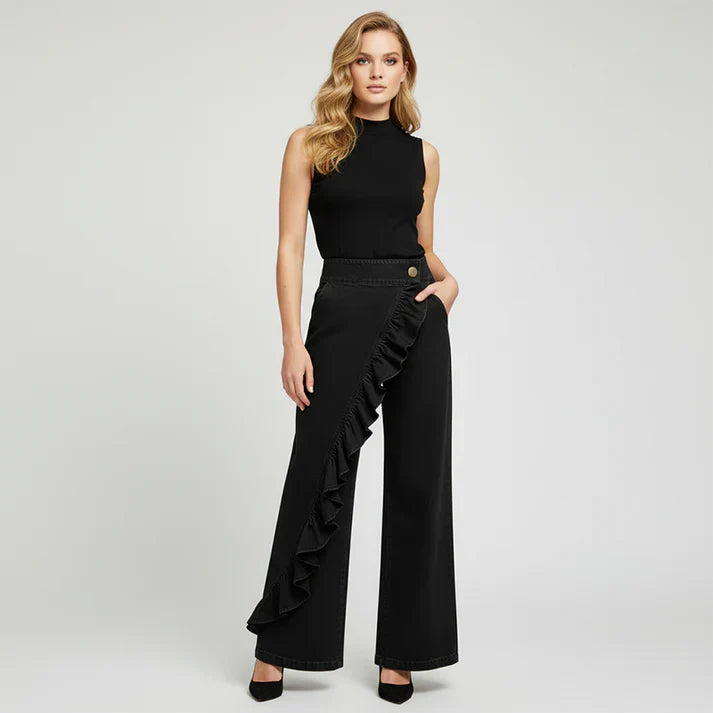 Violeta - Pantalones vaqueros asimétricos con volante y pierna ancha