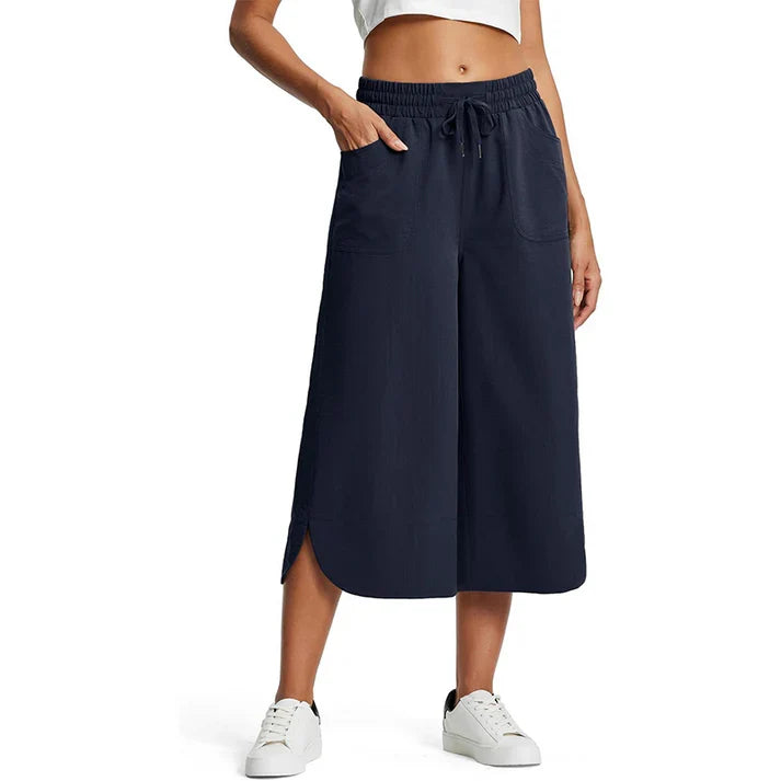 Aina - Pantalones cropped transpirables
