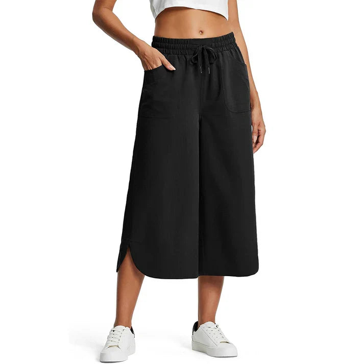 Aina - Pantalones cropped transpirables